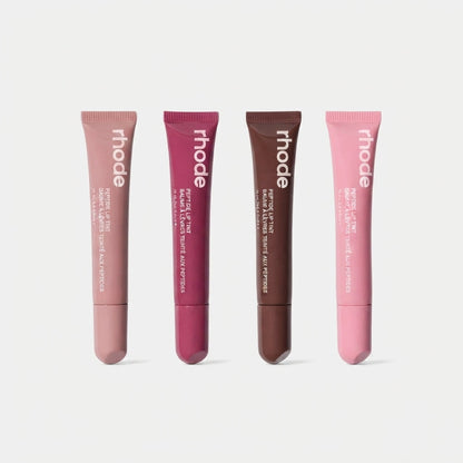 Nourishing Peptide Lip Tint Set with a glossy wash of color and deep hydration.